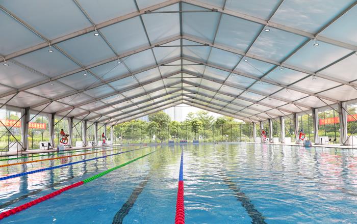 Swimming pool shade structures